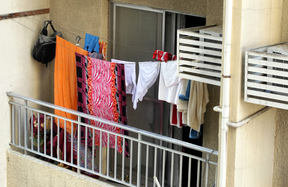 Abu Dhabi residents fined Dh1000 for drying clothes on their balconies -  The Filipino Times