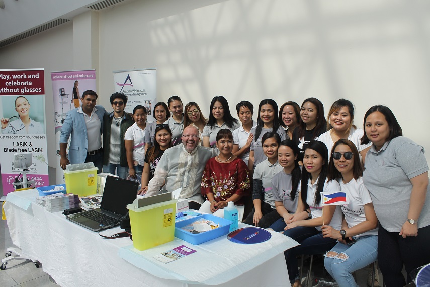 Dr. J.M. Gauer CEO and Chief of Surgery of RAK Hospital along with his wife Rina and hospital staff celebrate with PID with FilClub RAK