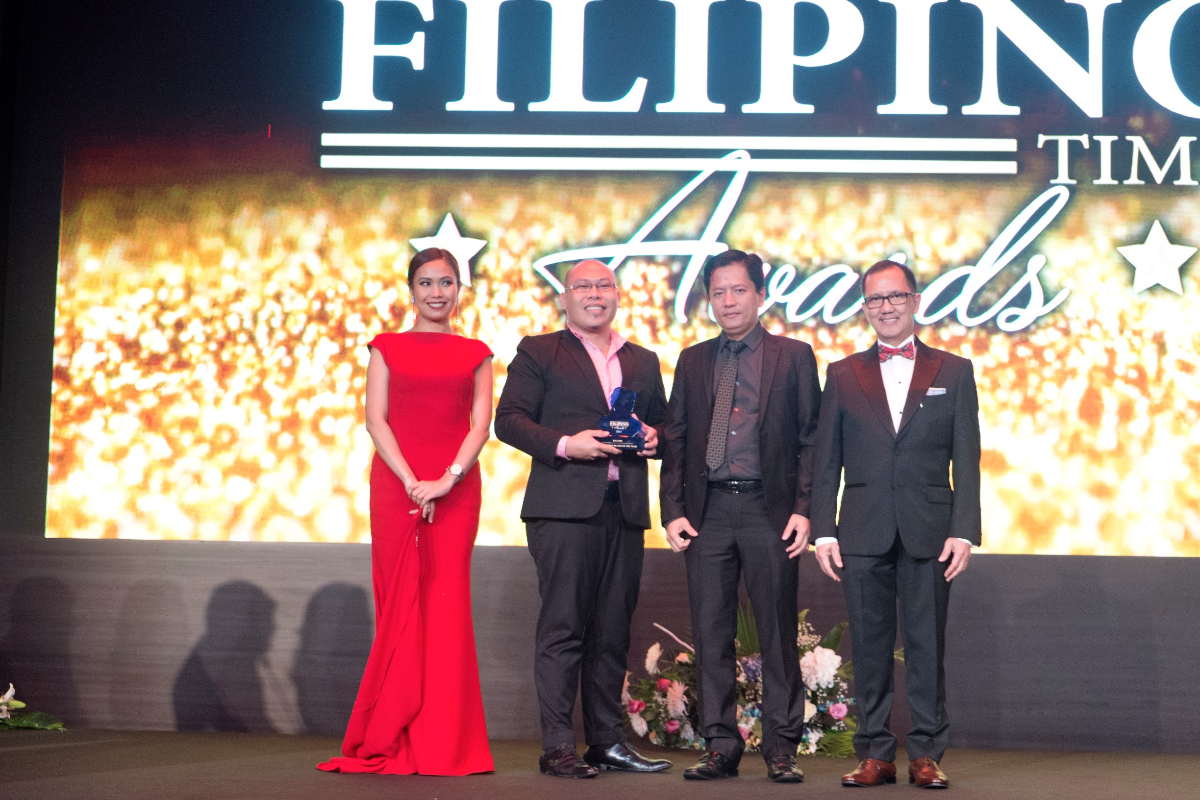 TFT Filipino Brand of the Year Jollibee Raffy Divina HEAD OF MARKETING and Jerome Sanguir HEAD OF OPERATIONS
