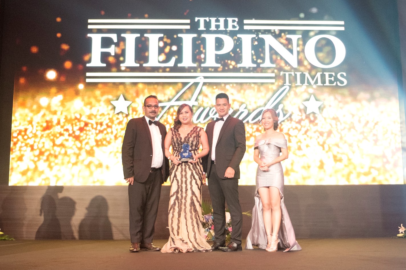 TFT Seafood Restaurant of the Year Ultimate Silver Bucket Liezl Quiliza Cruz OwnerFranchisor and Marjun Garcia Sy Account Manager