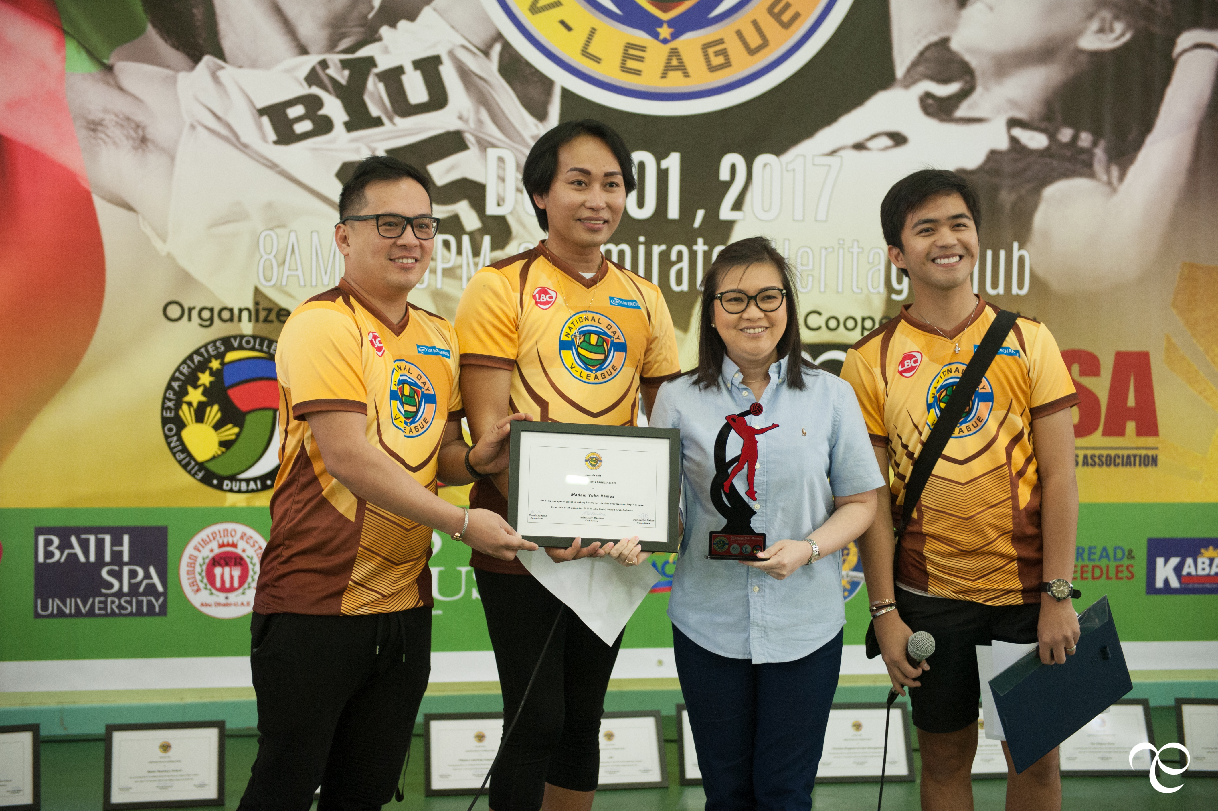 Madam Yoko Ramos Vingno receiving a gesture of certification to remember the event by