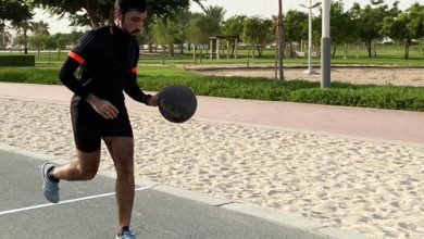 Azmat Khan running while dribbling a basketball tcm25 632653