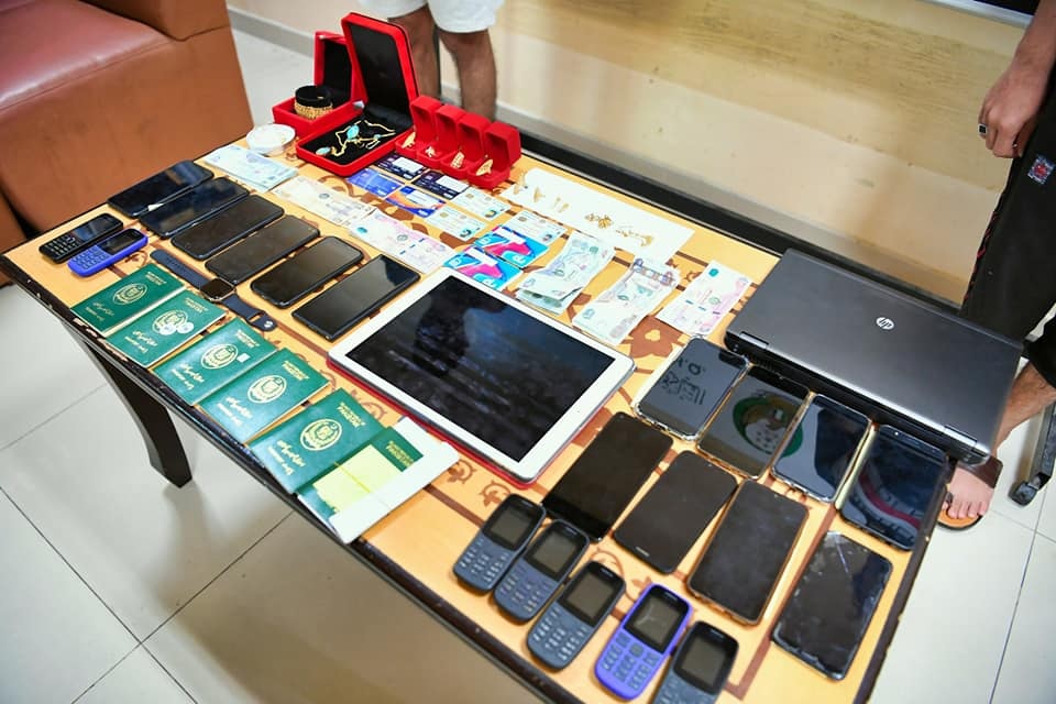 Ajman AED 2.8M phone scam gang 2