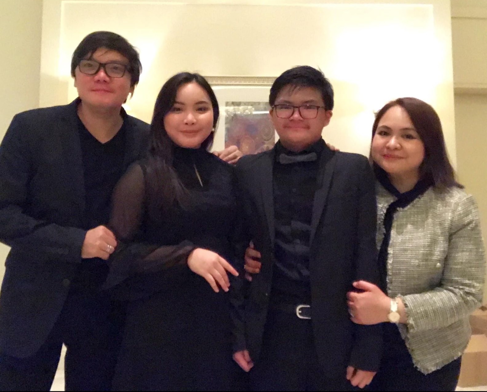 Mylene De Guzman with husband and kids