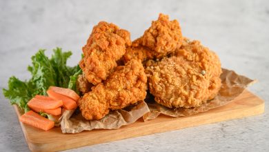 crispy fried chicken wooden cutting board Photo by jcomp at Freepik.com