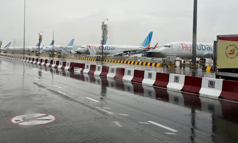TFT News REUTERS AIRPLANE DUBAI AIRPORT RAINING DUBAI