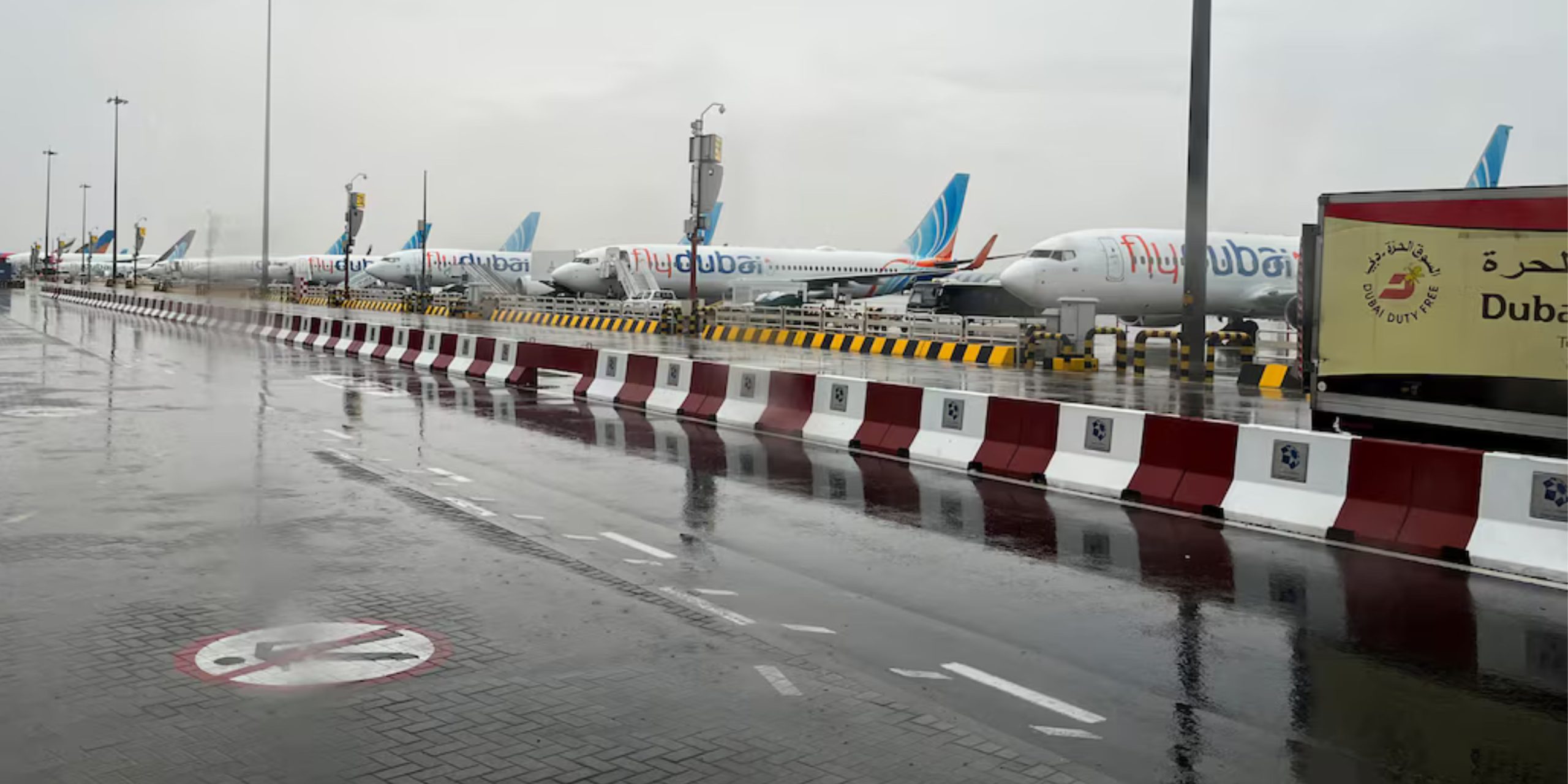 TFT News REUTERS AIRPLANE DUBAI AIRPORT RAINING DUBAI scaled