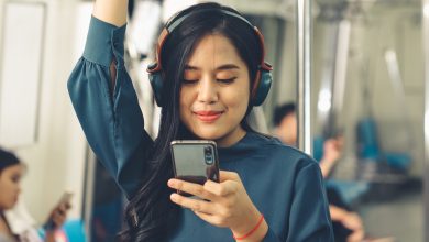 woman screentime on the train istock