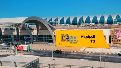 24 February 2021. Entrance to the terminal of modern Dubai DXB Airport. Airline hub concept