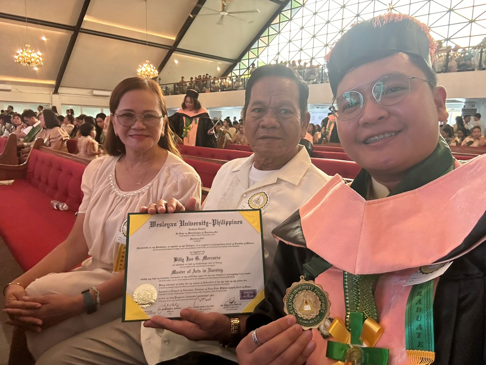 Master of Arts in Nursing Graduation with parents AUGUST 2024