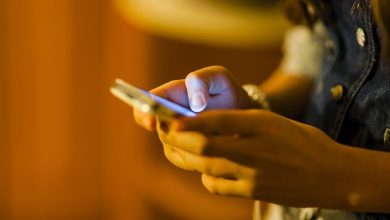 Hands texting on smartphone 1