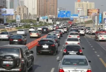 People drive along Al Wahda Street in Sharjah UAE. Al Wahda Street is the main route connecting Dubai to Sharjah